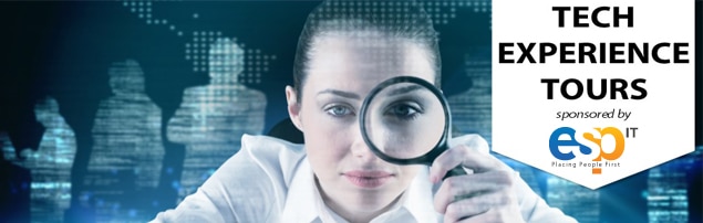 A woman looking through a magnifying glass