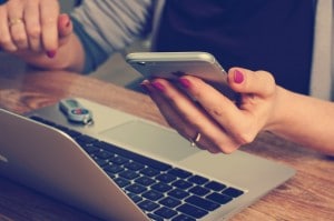 Image of person typing on the laptop with text "Removing The Tech Gender Gap: We Need Women Techies" from ESP IT in Minneapolis, MN.